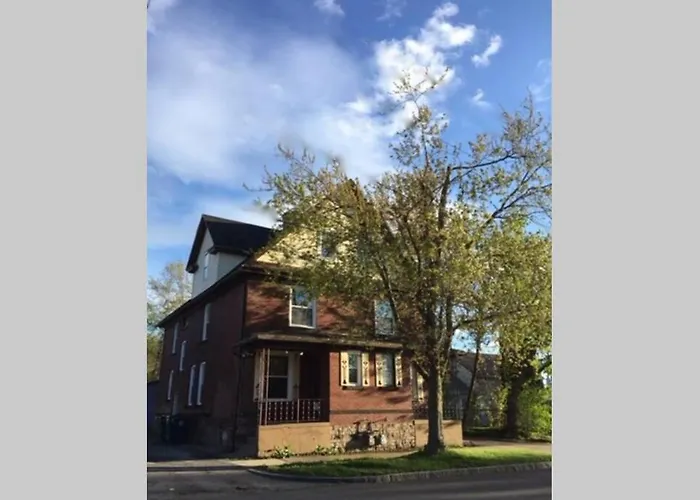 Falls Retreat: Riverside Downtown Getaway