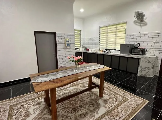 Rania Riverview Guesthouse #Bestguesthouseintown #Spaciouslivingroom #Modernclassicconcept #Luxurydiningset #Freewifi #Netflix #Fullyaircond #Cozyprayerspace