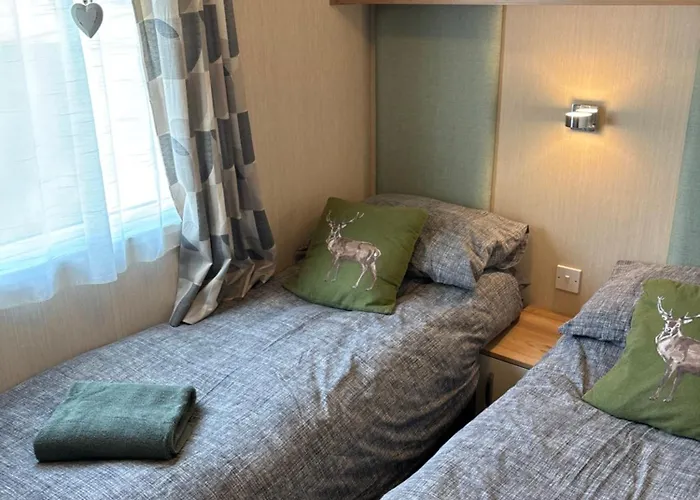 Woodpecker Lodge, Camelot Holiday Park, Ca6 5Sz