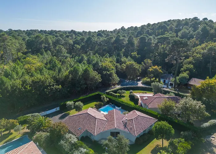 Villa familiale avec piscine chauffée, clim, 4 chambres, proche golf et plages - FR-1-319-565