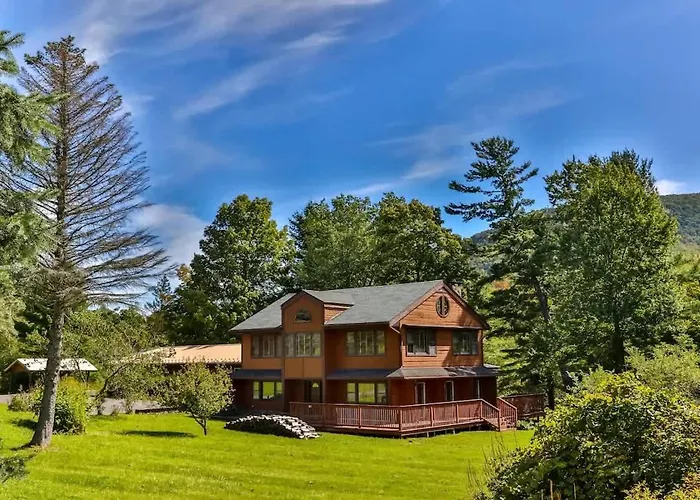 Stream-Side Atrium Home With Side Rooms & Pool Table