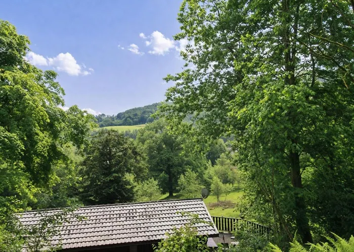 Neaum Crag Lodge Ideal For A Couple Or Family With Young Children In A Woodland Setting At Skelwith Bridge