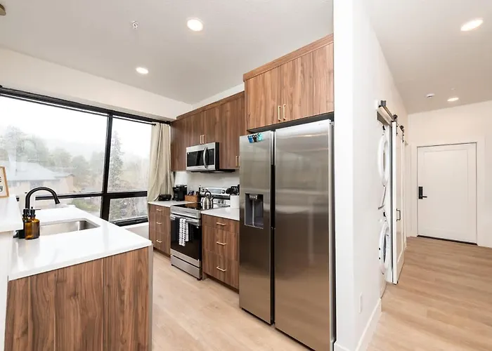 Modern Condo With Town And Mountain Views