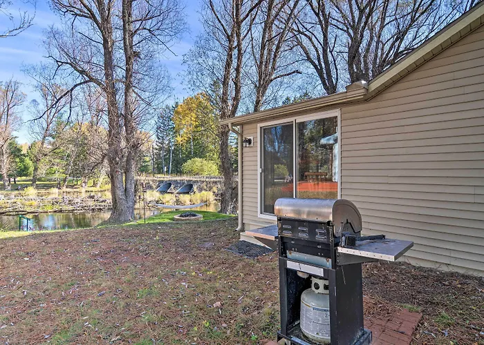 Riverfront Grayling Retreat W/ Fire Pit & Dock!
